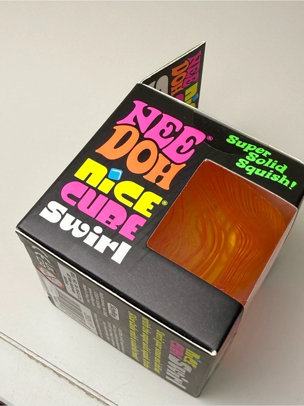 NeeDoh Nice Cube Swirl - Orange | NEE DOH Sensory Fidget Toy Super Solid Squish